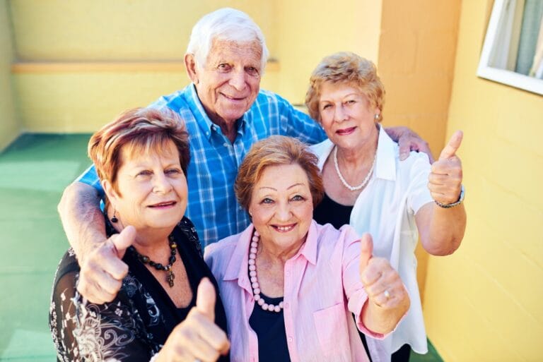 Elderly people thumbs up