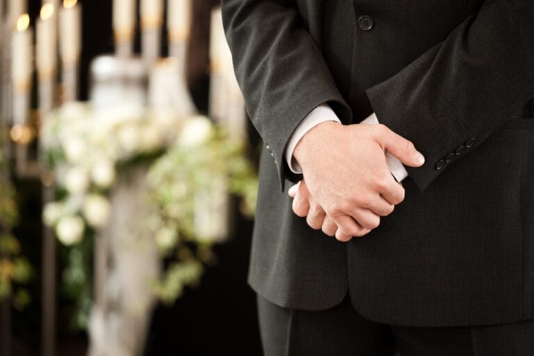 Man or Mortician at Funeral Mourning